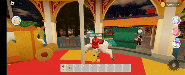 메타에버랜드에서 회전목마를 즐기고 있는 아바타. (사진=로블록스 플래이댑 랜드 캡처).