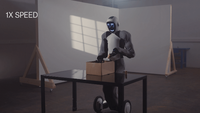 1X humanoid robot 'Eve' that puts and moves items in boxes (Photo = 1X) 