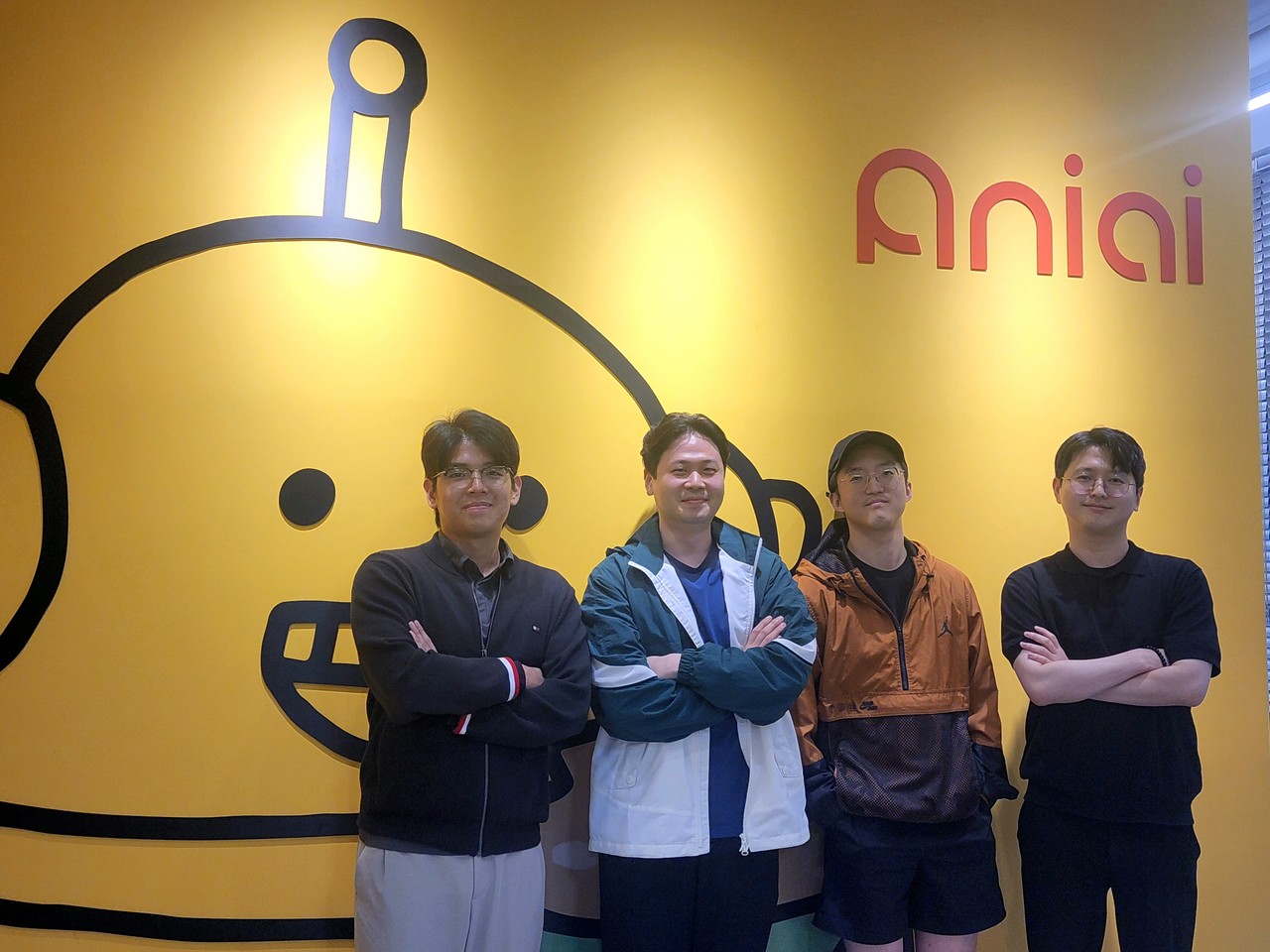 The ENIAI software engineering team is taking a group photo.